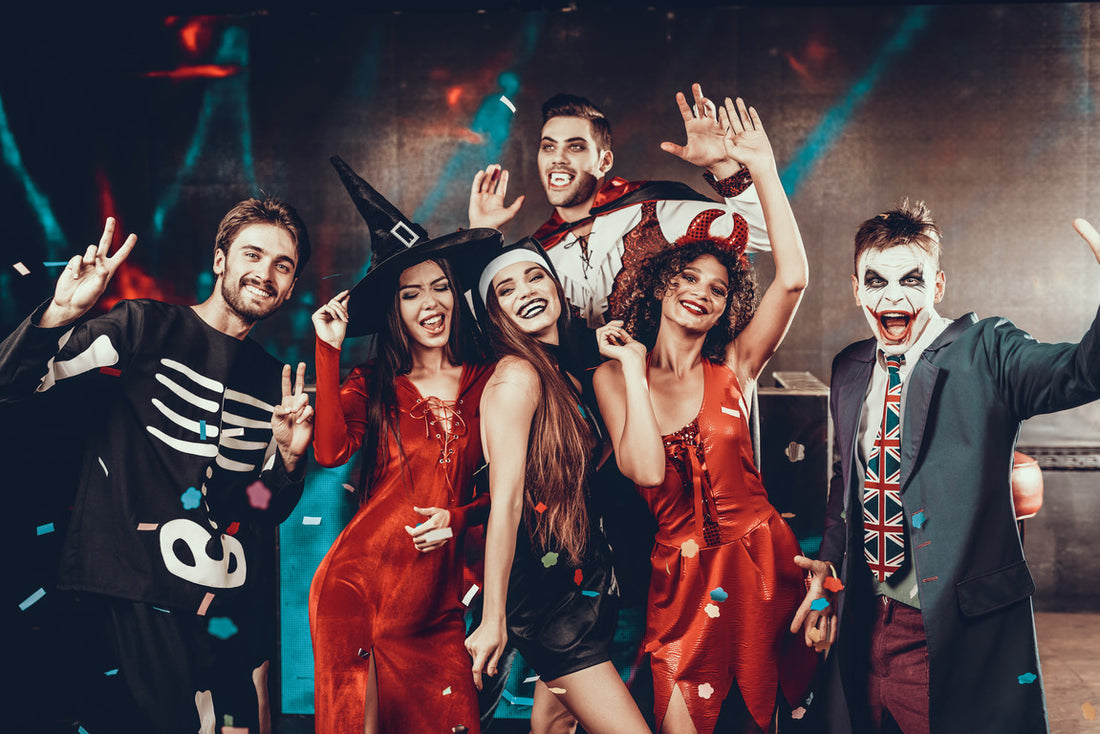 Portrait of Smiling People in Sexy Costumes