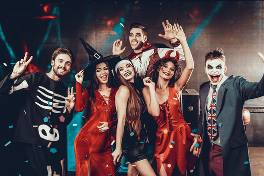 Portrait of Smiling People in Sexy Costumes